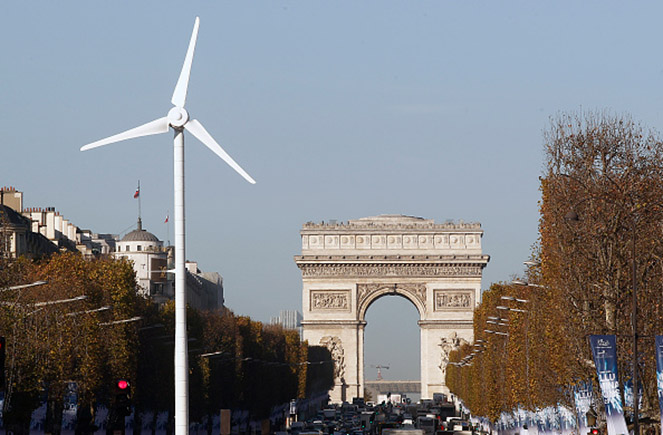 A wind turbine is installed to provide electricity for Christman illuminations on the Champs-Elysee on November 26,2015 in Paris,France.